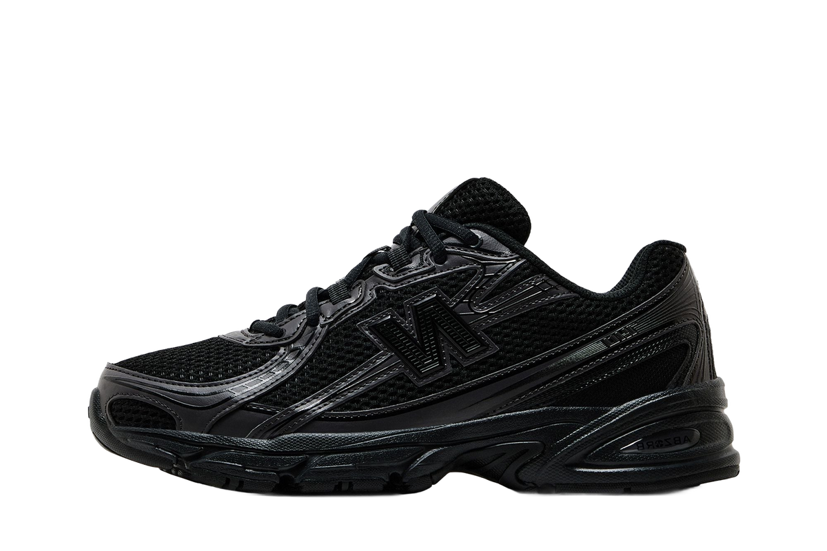 New Balance 740 Triple Black — transparent background